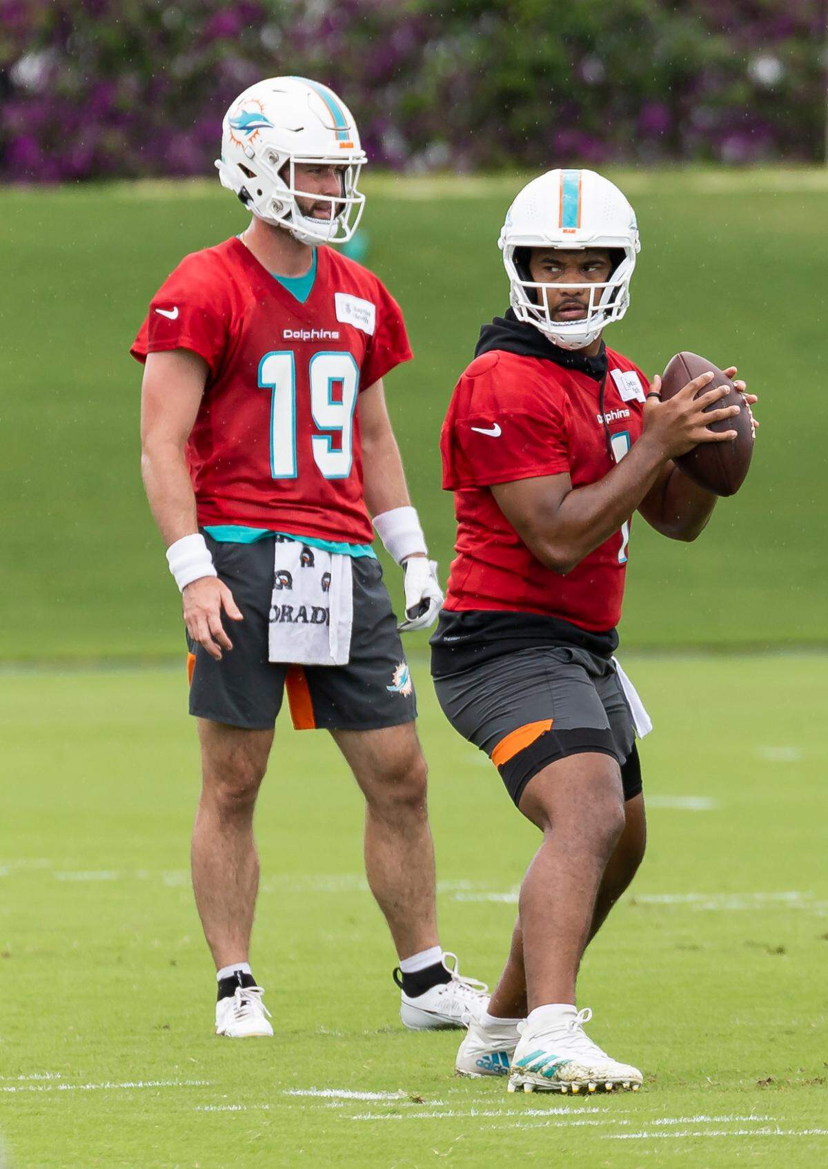 Miami Dolphins quarterback Tua Tagovailoa (1) runs drills during team practice at the Baptist Health Training Complex on Tuesday, May 23, 2023, in Miami Gardens, Fla.