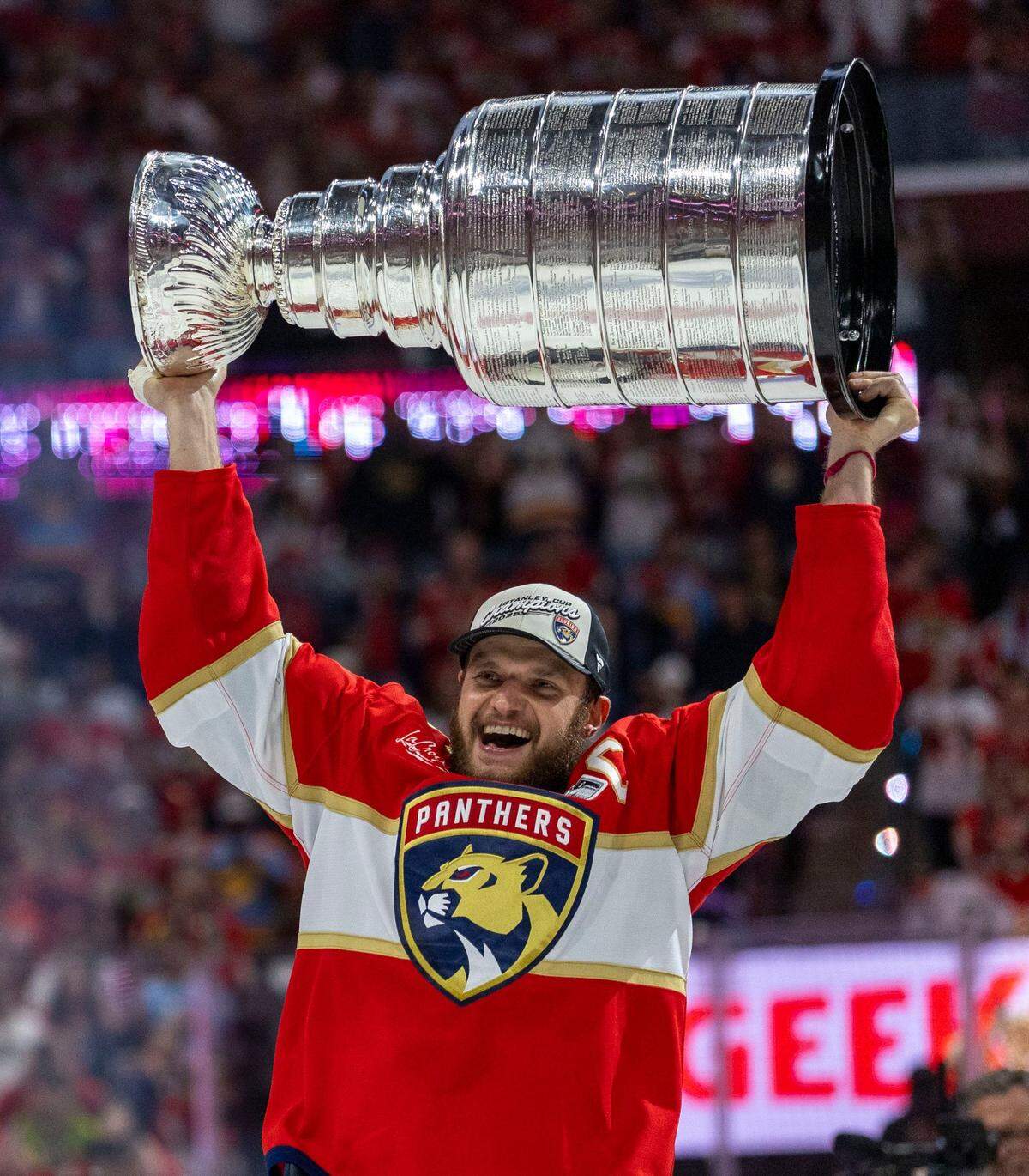Florida Panthers center Aleksander Barkov (16) lifts the Stanley Cup after the Panthers defeated the Edmonton Oilers in Game 6 to earn back-to-back titles.