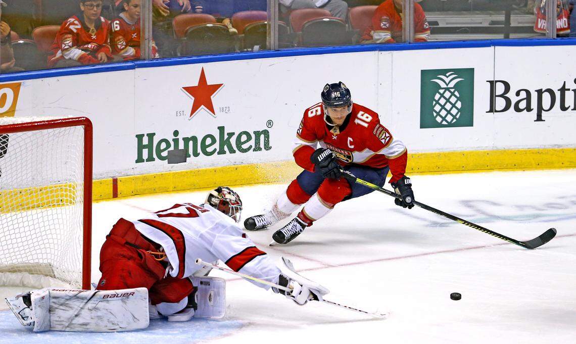 Carolina Hurricanes goalie James Reimer (47) defends the goal against Florida Panthers center Aleksander Barkov (16) during the third period of an NHL hockey game at the BB&T Center on Tuesday, October 8, 2019 in Sunrise.