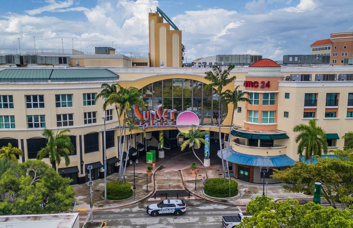 View of one of the entrances along Red Road in South Miami on the Coral Gables border to the 25 year old Shops at Sunset Place in South Miami on Sept. 11, 2024. During the first decade of the 2000s Jimmy Buffett’s Cheeseburger in Paradise restaurant chain, now defunct, had the street-level outlet on the bottom right. The mall complex may be torn down and redeveloped as a mixed use residence/office space/hotel and retail/restaurant location.