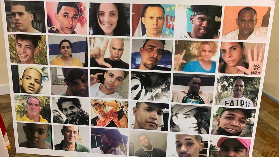 A poster with pictures of Cuban political prisoners was on display at a 2022 Doral news conference on the first anniversary of the July 11 protests in Cuba.