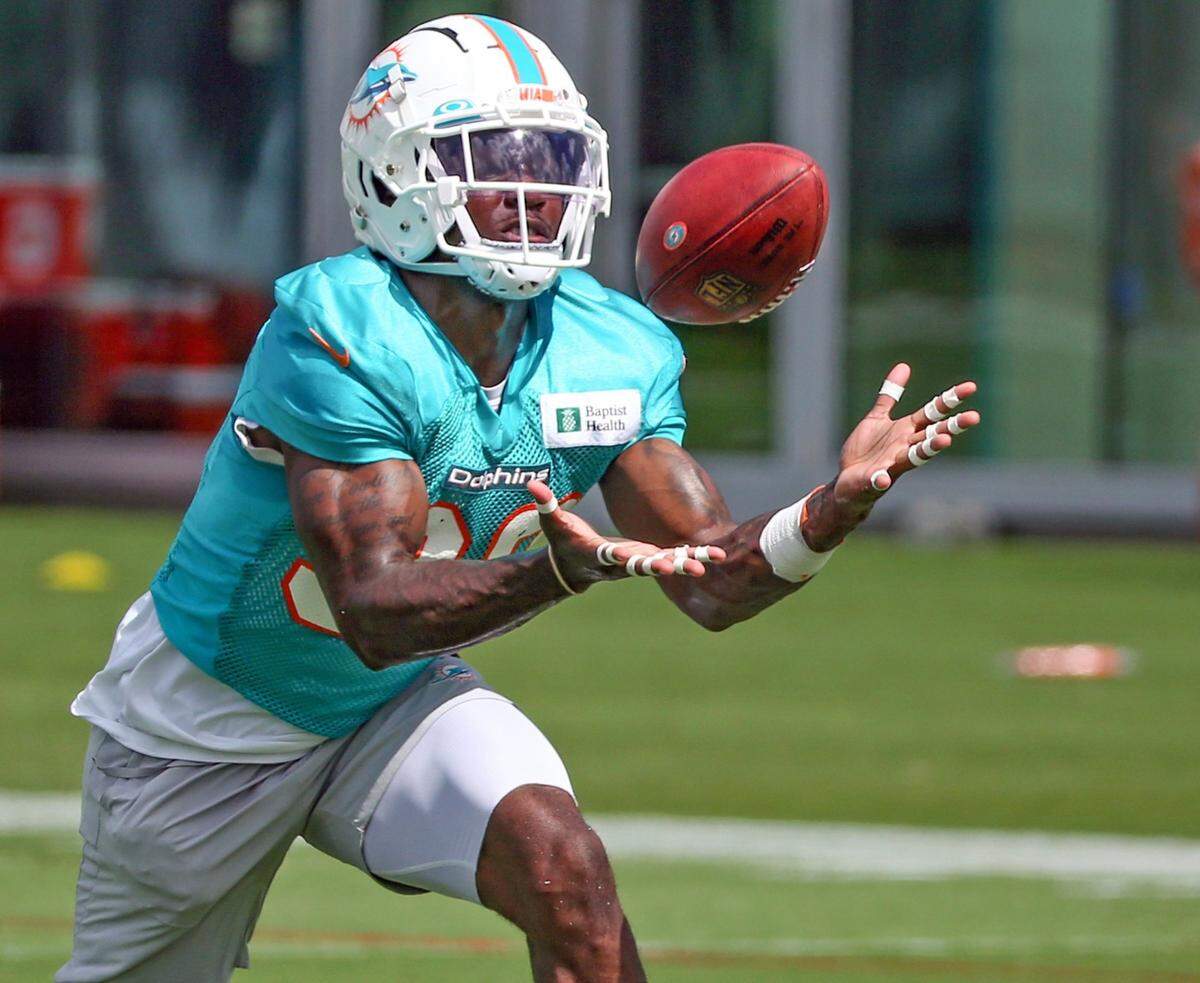 Miami Dolphins Kader Kohou (38) catches during practice drills at Baptist Health Training Complex in Miami Gardens on Friday, July 29, 2022.