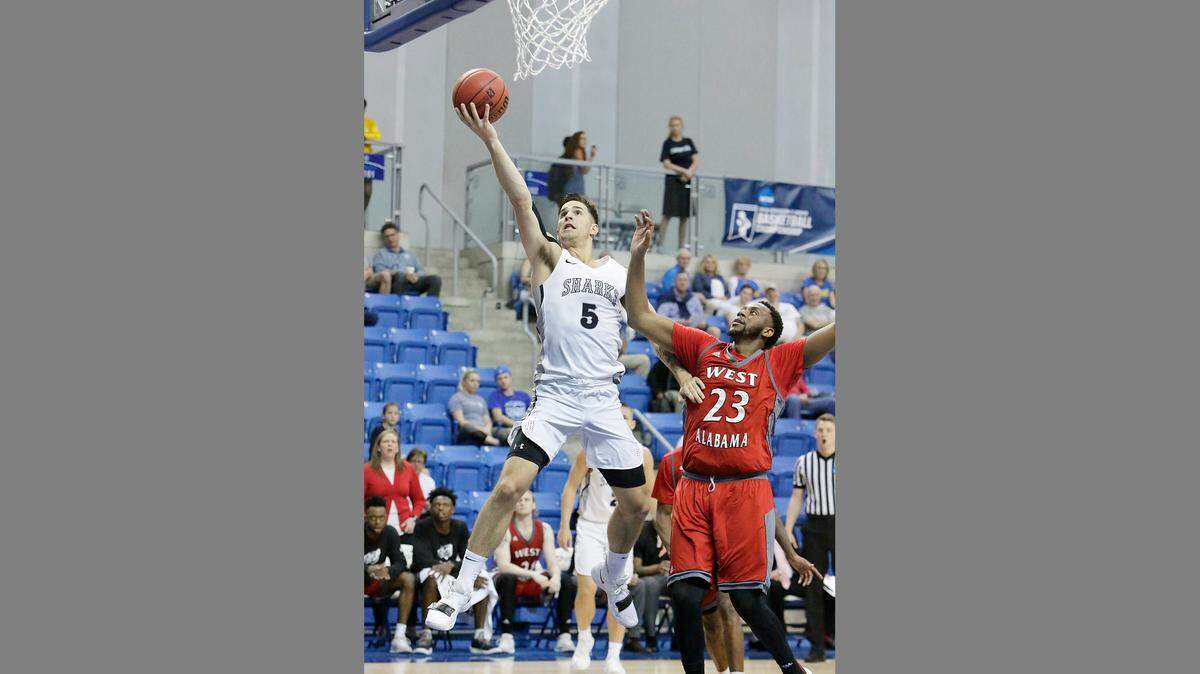 NSU Sharks’ Mark Matthews (5) goes for a shot against West Alabama Tigers during The NCAA 2019 Division II Men’s Basketball semifinal game on Saturday, March 16, 2019 at Rick Case Arena in Fort Lauderdale.