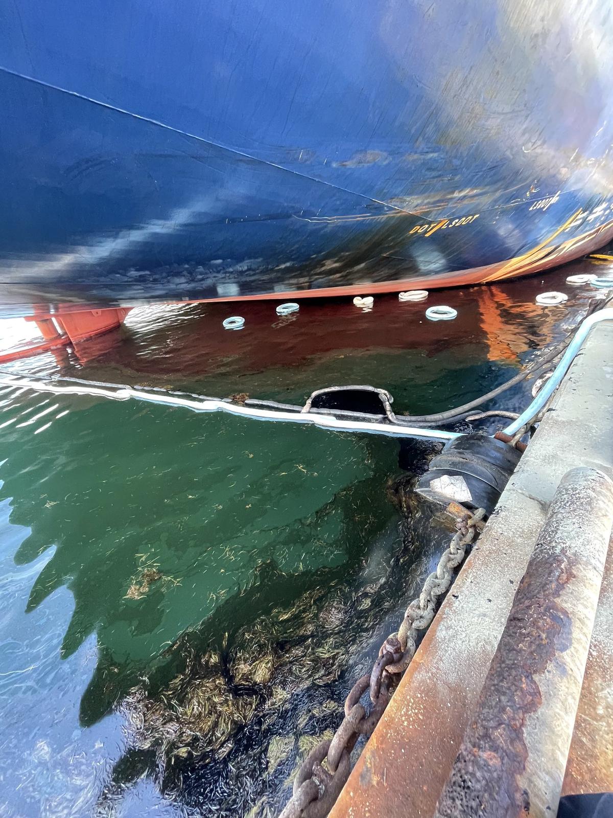 The Coast Guard released this image of fuel in the water near the container terminal at PortMiami Saturday afternoon, Aug. 13, 2022.