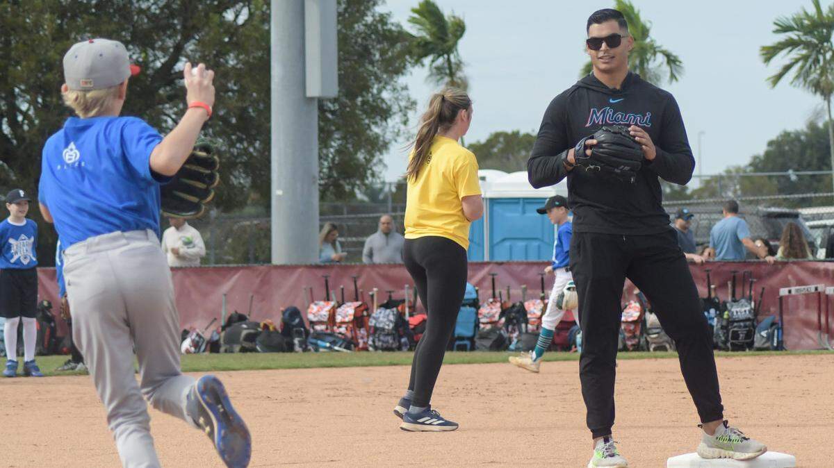 Miami Marlins pitcher Jesus Luzardo helps run drills during a baseball clinic at Stoneman Douglas High in Parkland, Florida, on Saturday, Jan. 20, 2024. Luzardo and high school teammate Colton Welker, both Stoneman Douglas alums, have held a baseball clinic at the school together for the past four years.