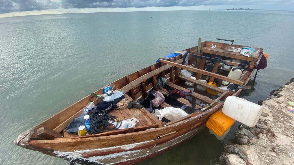 A wooden Cuban migrant boat is tied to a sea wall in the Fills area of Indian Key in the Florida Keys on Friday, Oct. 12, 2022.
