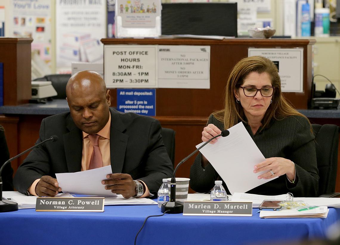 North Bay Village City Attorney Norman C. Powell, left, and Village Manager Marlen D. Martell during a commission meeting at the North Bay Village City Hall on Tuesday, May 8, 2018.