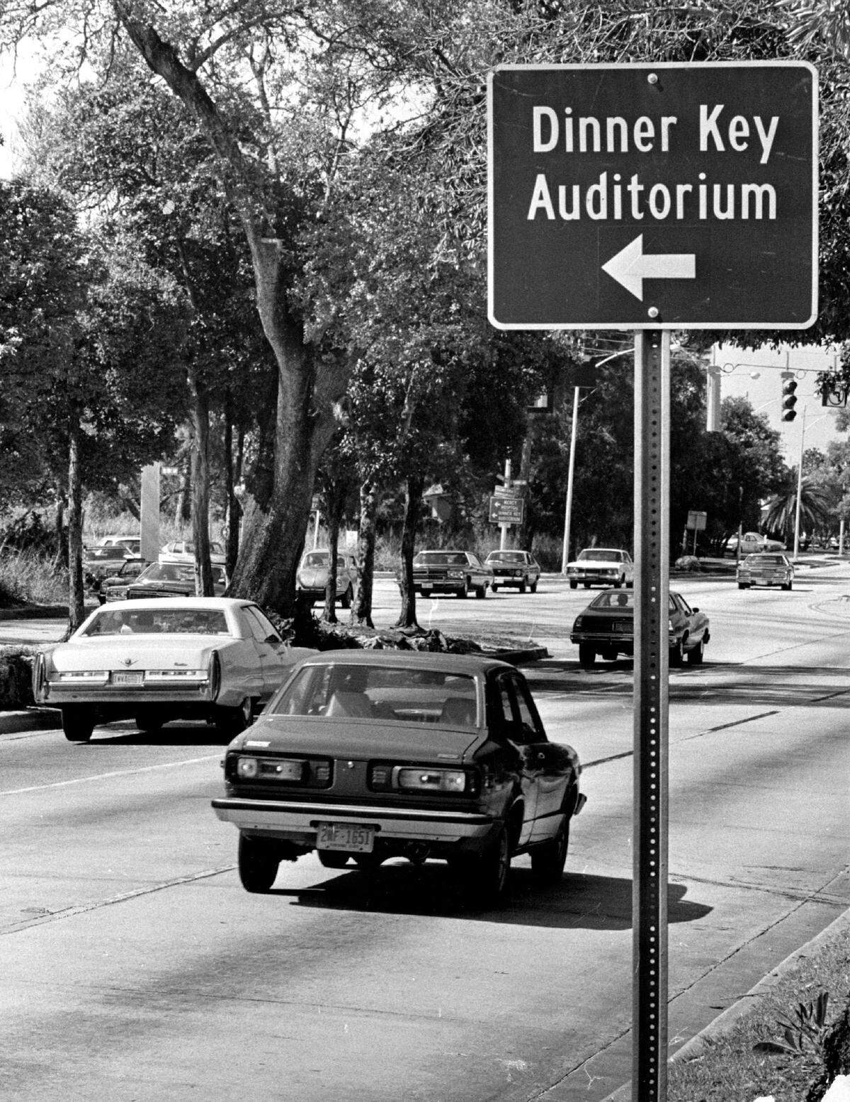 In 1976, a sign on U.S. 1 pointing drivers to the Dinner Key Auditorium in Coconut Grove.