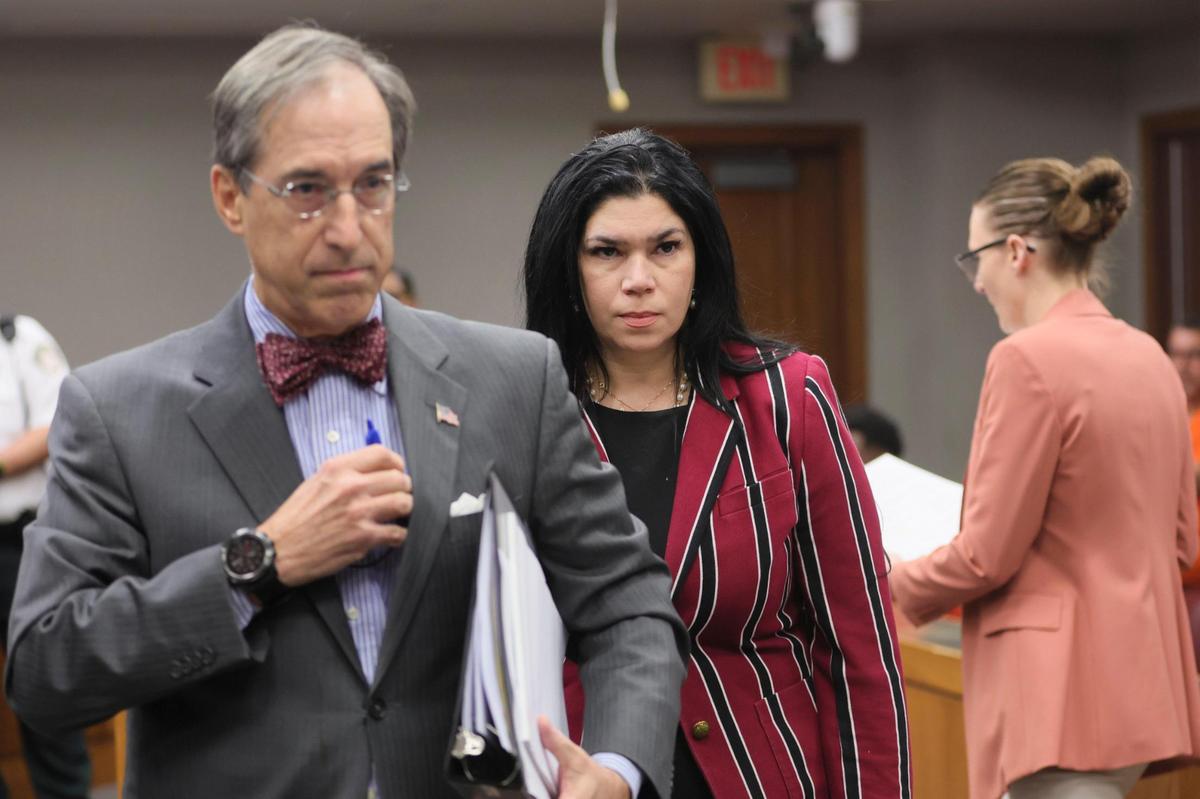 Miami, Florida, February 9, 2024 - Former Miami-Dade School Board member Lubby Navarro walks out of a courtroom behind her attorney, Benedict P. Kuehne, after pleading not guilty to charges that she spent more than $100,000 of taxpayer dollars on personal items and trips for herself and her ex-boyfriend.