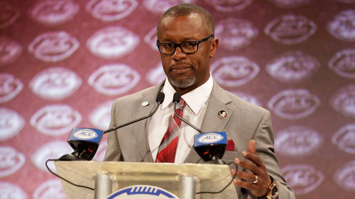 Florida State head coach Willie Taggart Cam answers a question during a news conference at the NCAA Atlantic Coast Conference college football media day in Charlotte, N.C., Thursday, July 19, 2018. (AP Photo/Chuck Burton)