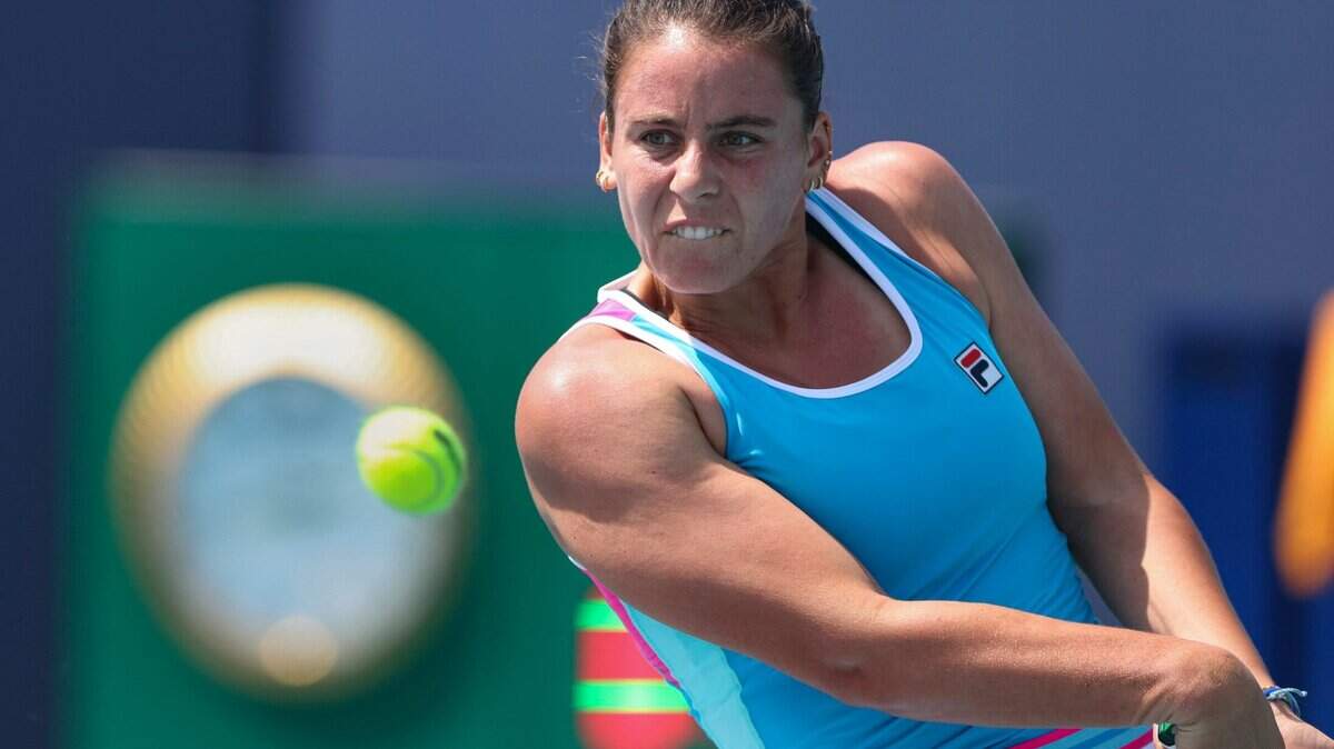 Emma Navarro, from the USA, returns the ball during a qualifying match at the Miami Open on Monday, March 20, 2023, in Miami Gardens. Navarro lost the match.