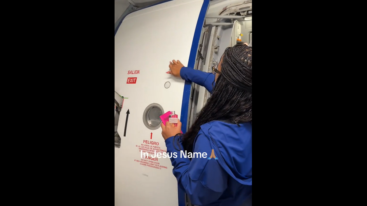 A Florida woman’s Feb. 15 TikTok video shows her rubbing a small amount of blessed oil on a JetBlue plane before boarding.