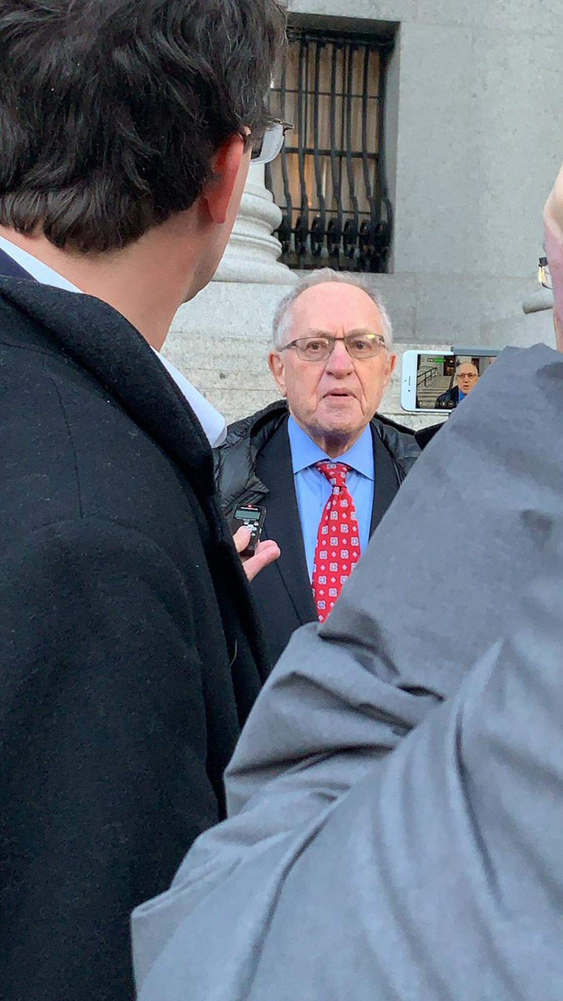 Famed First Amendment attorney Alan Dershowitz speaks outside the courtroom in New York after a hearing on a sealed lawsuit involving his friend and former client, Jeffrey Epstein.