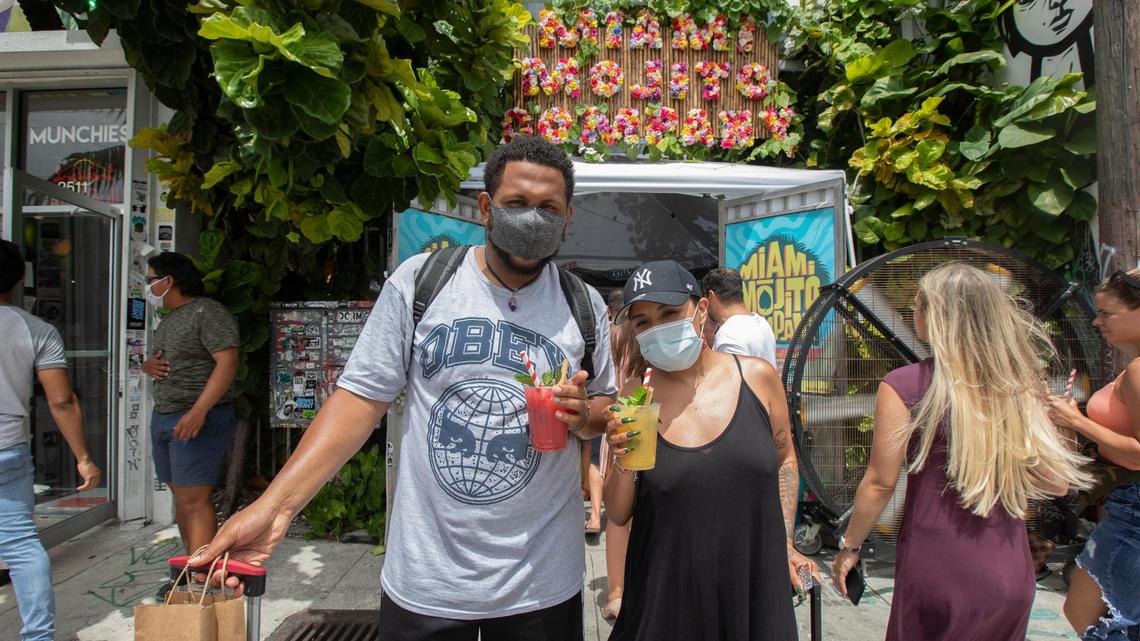 Denzel Lee and Lupita Hernández-Lee wearing a mask, after getting a Mojito at Miami Mojito Company in Wynwood on Sunday, June 28th., 2020.