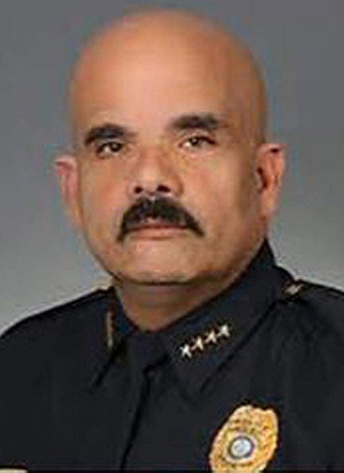 Former Biscayne Park Police Chief Raimundo Atesiano