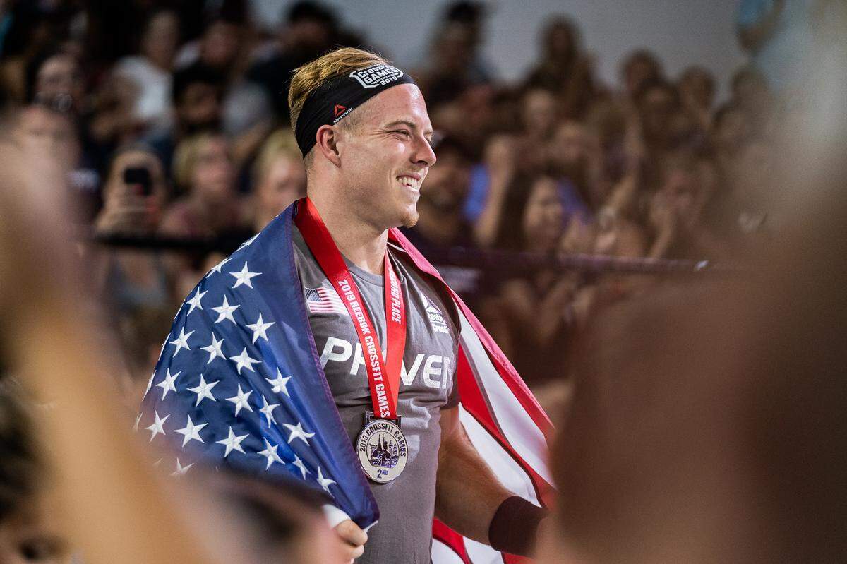 Noah Ohlsen stands with his Silver medal at the 2019 CrossFit Games in Madison, Wisconsin.