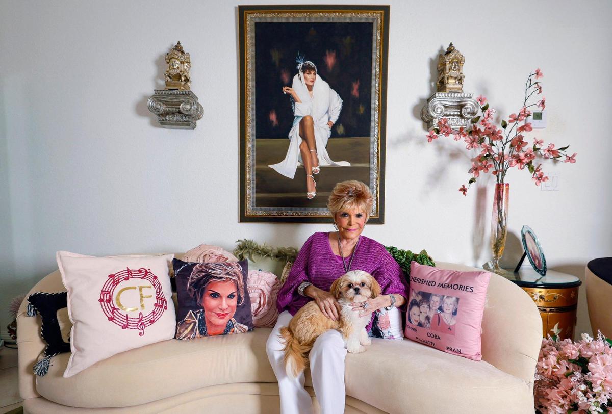 Connie Francis, a popular American pop singer of the late-1950s and early-1960s, sits in her living room with her dog Lexi at their home in Parkland, Florida on Friday, June 6, 2025. Her obscure 1962 song “Pretty Little Baby” has had viral success on social media in 2025.