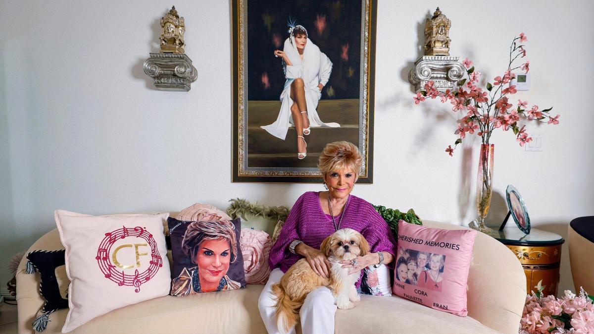 Connie Francis, a popular American pop singer of the late-1950s and early-1960s, sits in her living room with her dog Lexi at their home in Parkland, Florida on Friday, June 6, 2025. Her obscure 1962 song “Pretty Little Baby” has had viral success on social media in 2025.