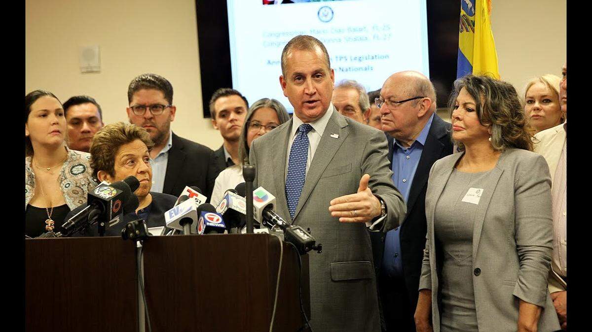 Democratic U.S. Rep. Donna Shalala, left, and Rep. Mario Diaz-Balart, a Republican, stand together in support of Temporary Protected Status for Venezuelans.