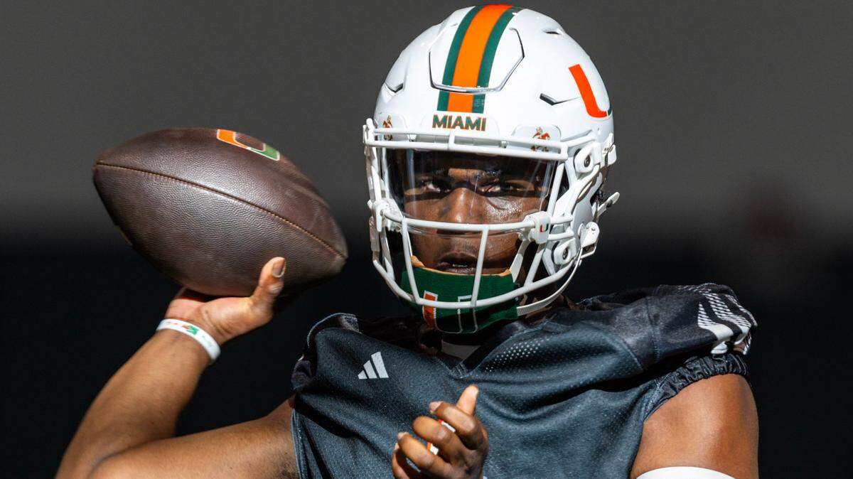 Miami Hurricanes quarterback Cam Ward (1) throws the ball during practice at the Carol Soffer Indoor Practice Facility on Wednesday, July 31, 2024, in Coral Gables, Fla.