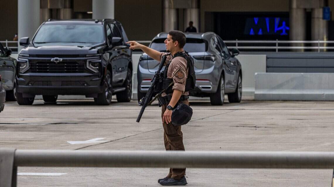 Airport suspect was shooting toward the terminal, Miami-Dade deputies say