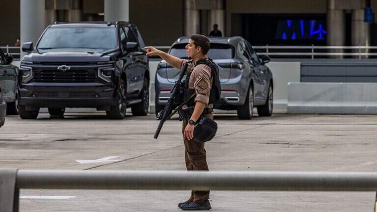 Airport suspect was shooting toward the terminal, Miami-Dade deputies say