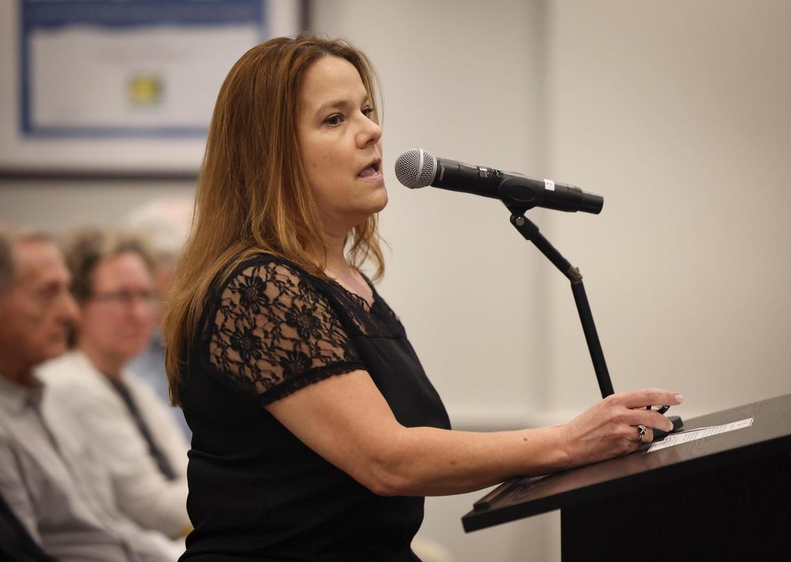 Laura McNaughton speaks against a proposal on the docket during a Pinecrest Village Council meeting on Tuesday, Jan. 10, 2023, in Pinecrest.