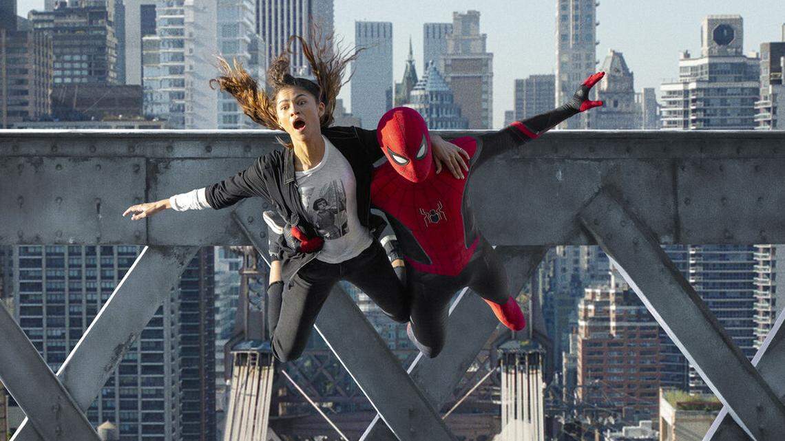 This image released by Sony Pictures shows Zendaya, left, and Tom Holland in Columbia Pictures’ ”Spider-Man: No Way Home.” (Sony Pictures via AP)