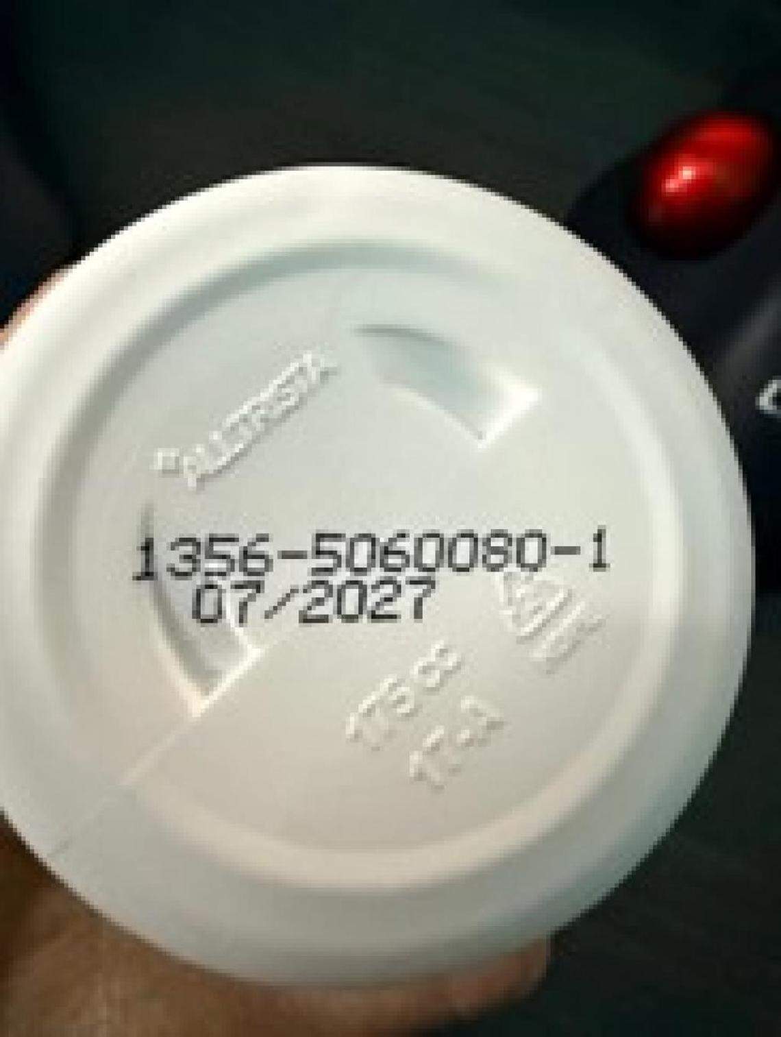 Where you’ll find the lot numbers on bottles of Rosabella Moringa Capsules. The lot number is the middle seven digits starting with “5.”
