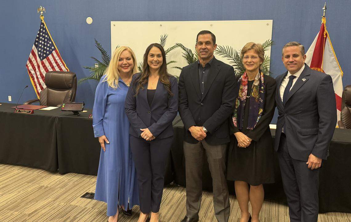 (From left to right) Miami-Dade Supervisor of Elections Alina Garcia, Miami-Dade County Commissioner Natalie Milian Orbis, Coral Gables Mayor Vince Lago, Coral Gables Vice Mayor Rhonda Anderson and Miami-Dade County Tax Collector Dariel Fernandez pose for a photo following a town hall Lago hosted in the city’s public safety building on Monday, March 9, 2026, to discuss ballot questions in the city’s upcoming vote-by-mail election.