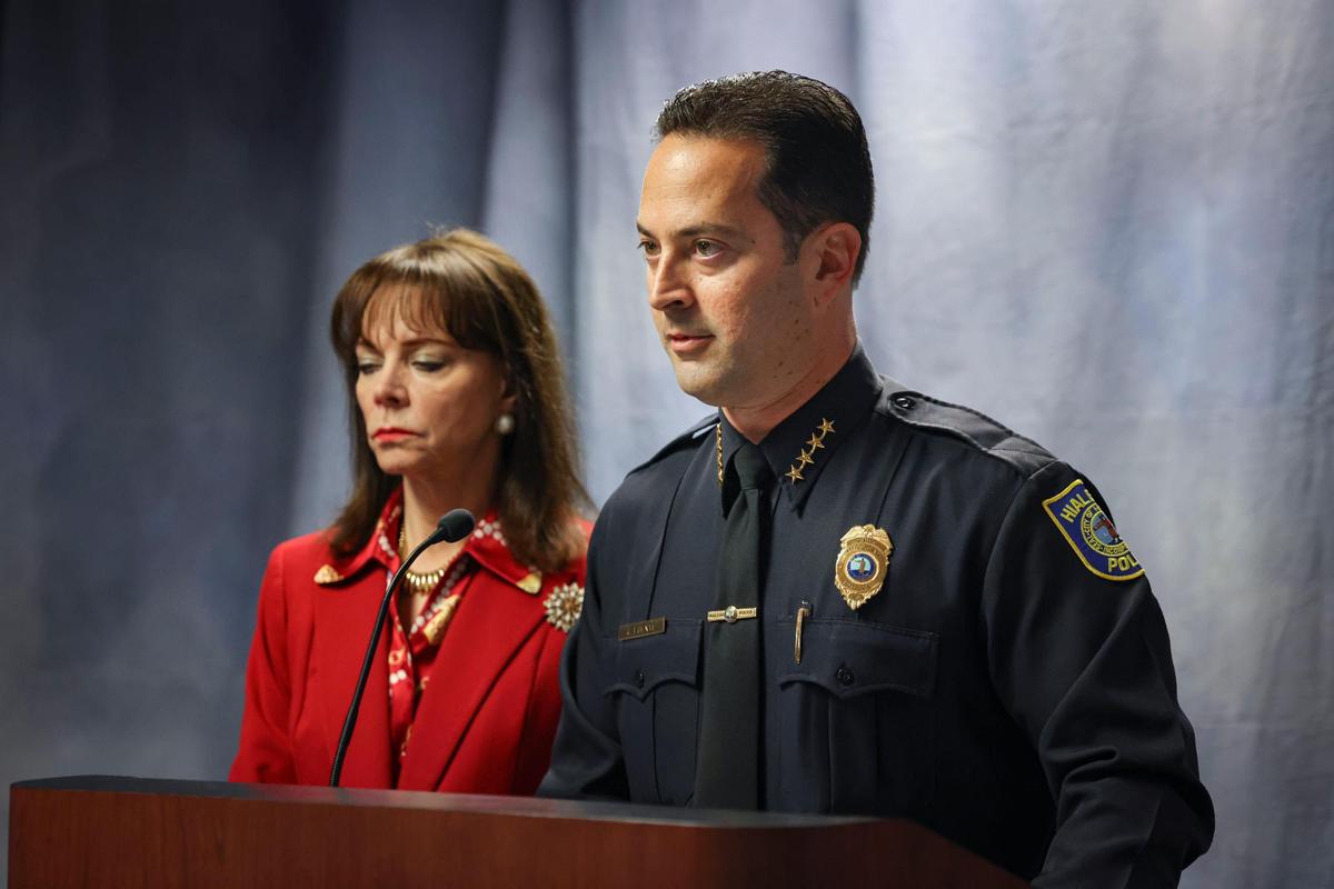 George Fuente, chief of the Hialeah Police Department, said it was a ‘sad and disappointing day.’ after the arrest of two of his officers. He and State Attorney Katherine Fernandez Rundle, left, announced the charges at a press conference on Thursday.