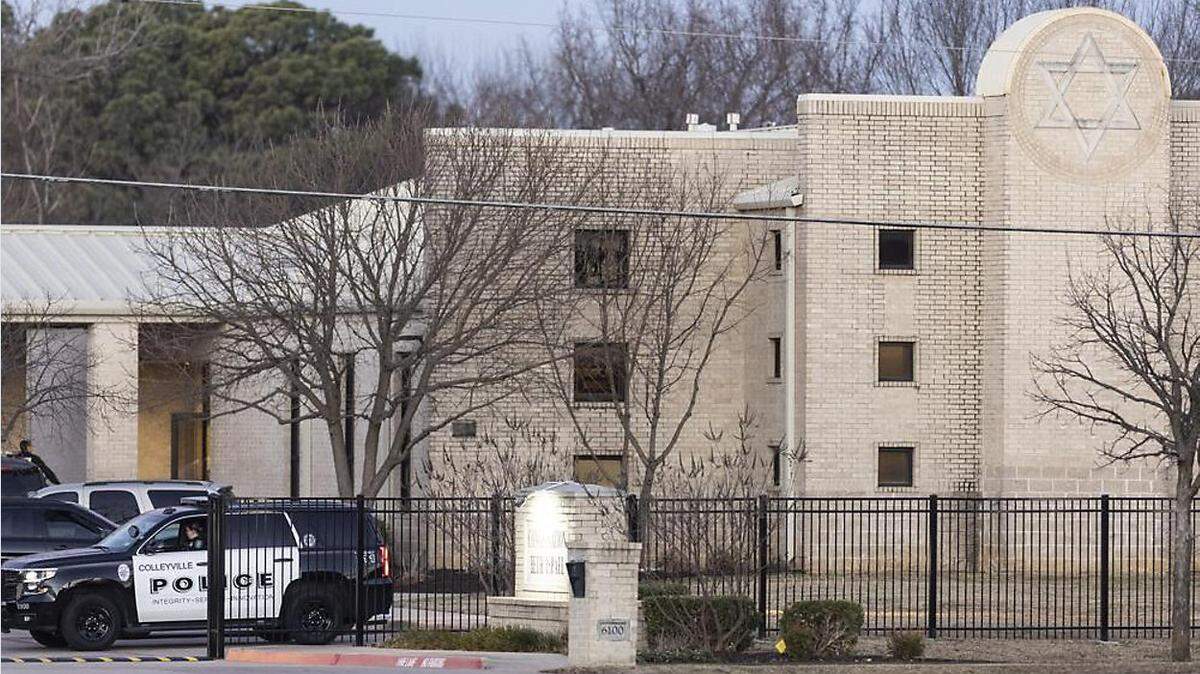 Police stand in front of the Congregation Beth Israel synagogue, in Colleyville, Texas, where four people were held hostage in January.