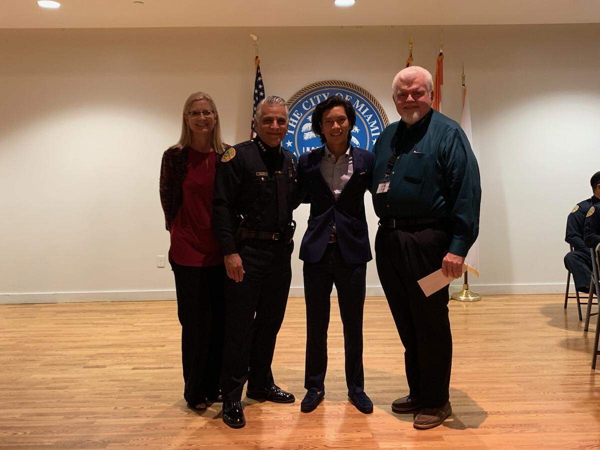Noa Sohn of the School for Advanced Studies recently was recognized by Do the Right Thing Miami for his efforts to restore the Lincoln Memorial Park Cemetery. From left: Do the Right Thing Executive Director Jodi Atkison, Miami Police Chief Jorge Colina, Noa and School for Advanced Studies’ Do the Right Thing Coordinator Dennis Lindsay.