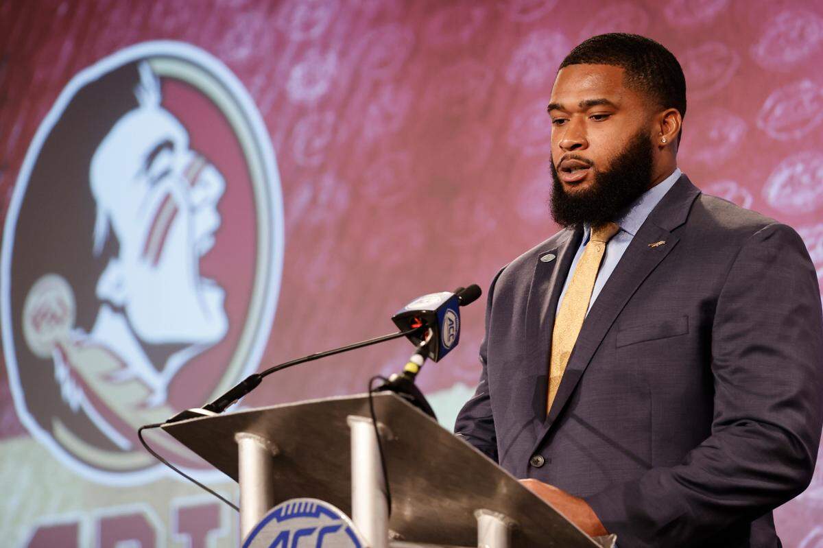 Florida State defensive tackle Fabien Lovett answers a question at the NCAA college football Atlantic Coast Conference Media Days in Charlotte, N.C., Wednesday, July 20, 2022.