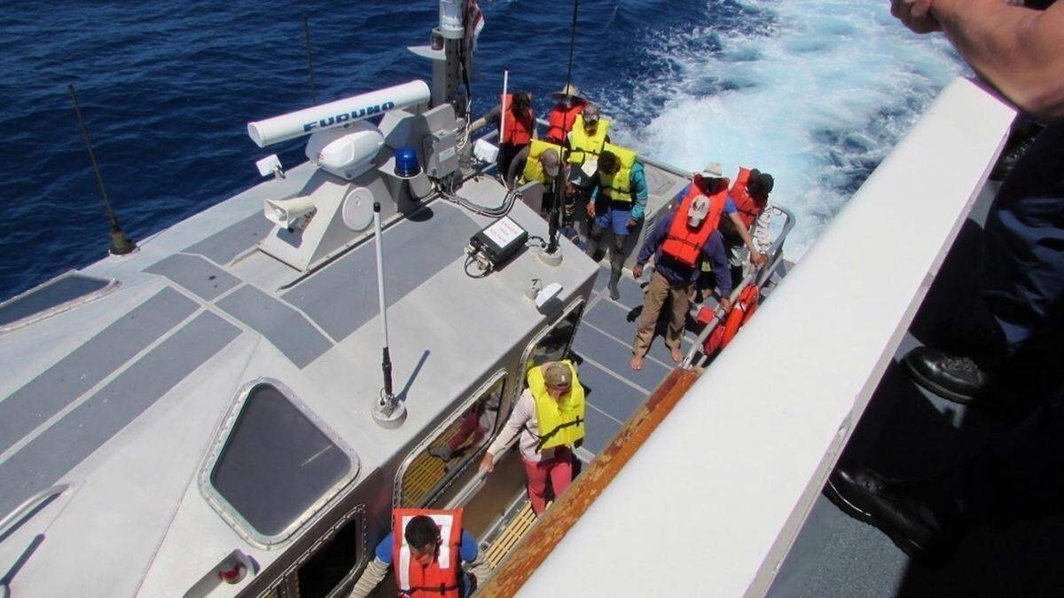 The Coast Guard Cutter Isaac Mayo receives 10 Cuban migrants on Monday, April 1, 2019, interdicted after attempting to illegally enter the United States, according to an agency press release.