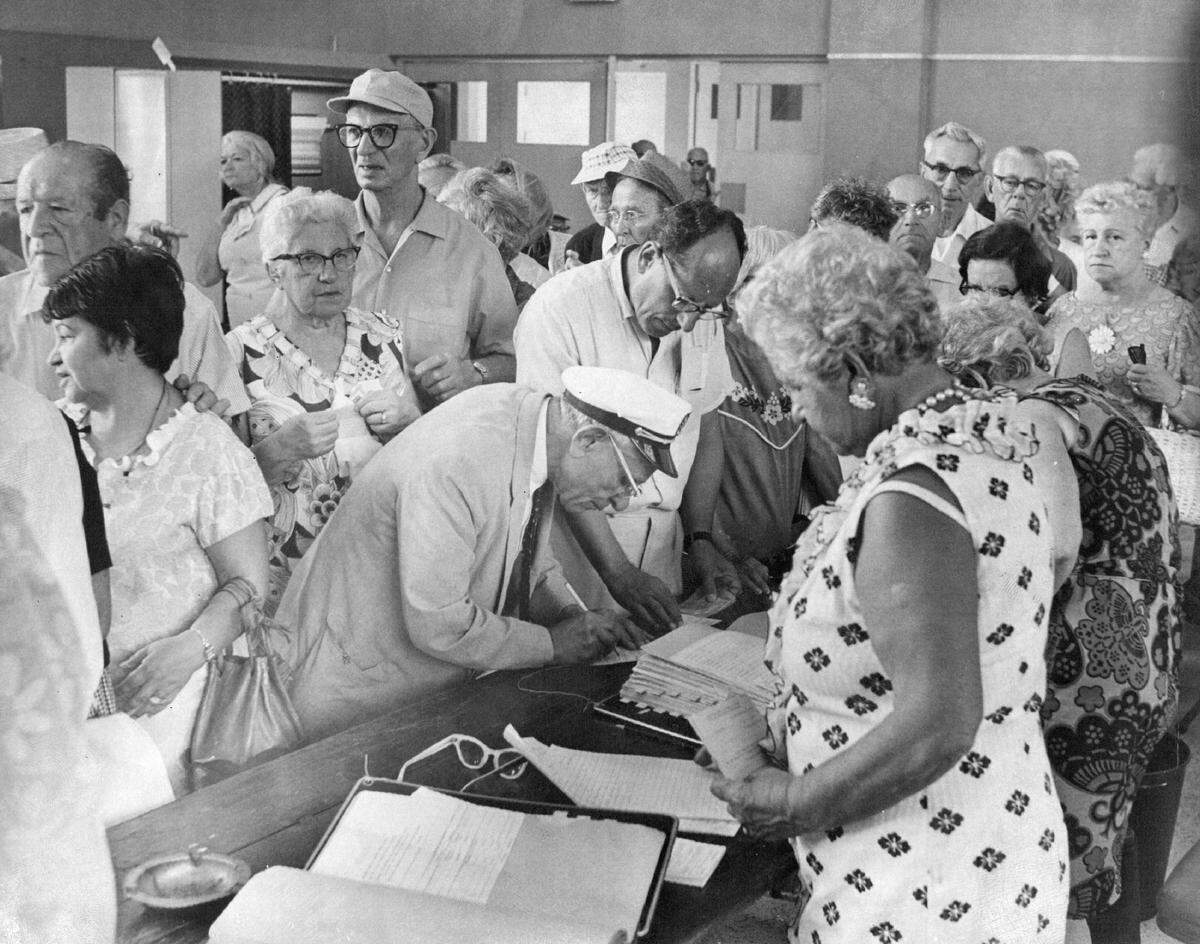 Crowds at a Miami Beach precinct in 1969.