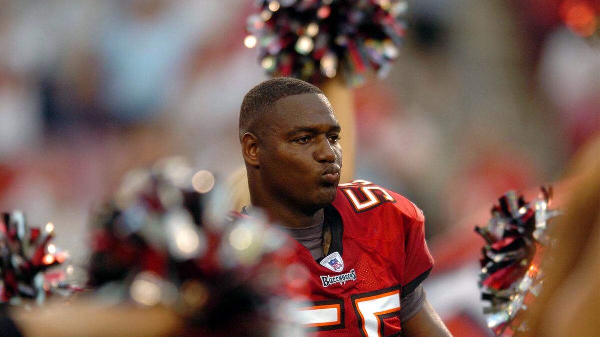 In this file photo, Bucs’s LB Derrick Brooks dances as he watches his teammates get announced at the start of the Bucs’ first home game of the season against Jacksonville.