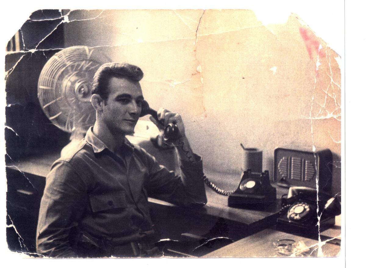 Hector Sanyustiz, the man who drove a bus into the Peruvian Embassy and started the Mariel uprising (Havana 10,000) shown here in his Cuban military uniform before the event. photog unknown -- Photo supplied by Sanyustiz’s family