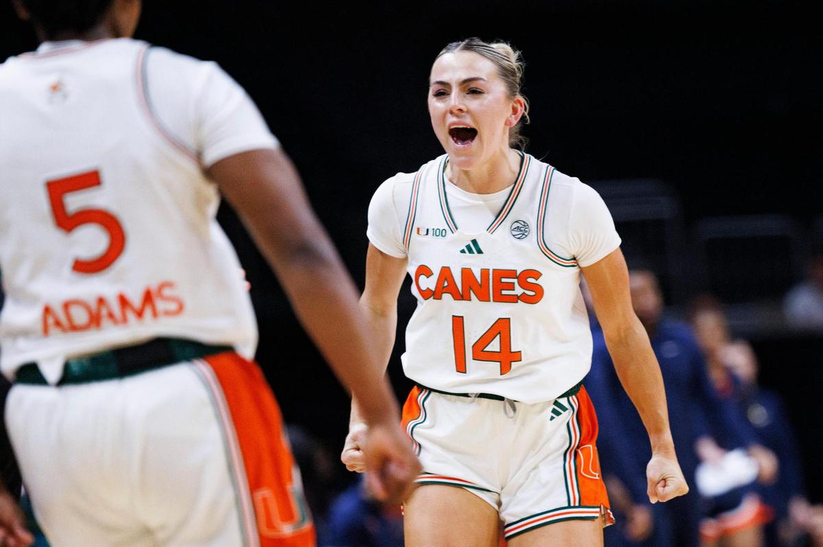 Miami Hurricanes Haley Cavinder(14) reacts to the Hurricanes pulling ahead during the third quarter of a game on Thursday, Jan. 30, 2025, at Watsco Center in Coral Gables, Fla.