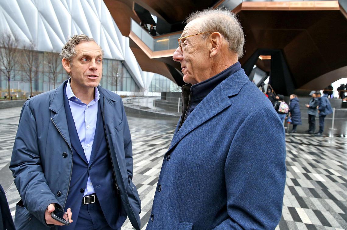 Bruce Beal Jr., and Miami Dolphins owner Stephen Ross, talk outside the Equinox Hudson Yards Hotel in New York City on Dec. 9, 2019. Ross’ Hudson Yards development is the largest private real estate development in the United States by area.