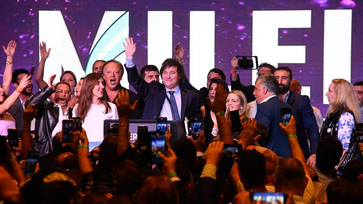 Javier Milei, Argentine presidential candidate, is cheered by supporters in Buenos Aires after election results were announced.