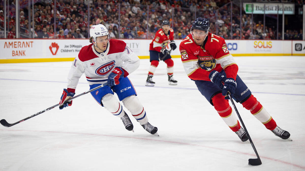 Florida Panthers defenseman Niko Mikkola (77) looks around Montreal Canadiens center Jake Evans (71) for an open teammate during the second period of a hockey game on Thursday, Feb. 29, 2024, at Amerant Bank Arena in Sunrise, Fla.