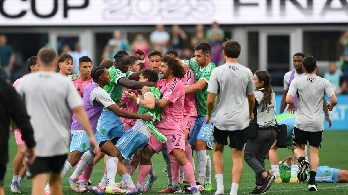 Aug 31, 2025; Seattle, Washington, USA; Seattle Sounders FC and Inter Miami CF push and shove after the game at Lumen Field. Mandatory Credit: Steven Bisig-Imagn Images