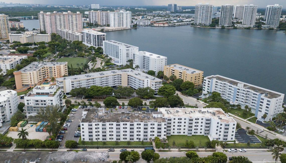Aerial view of the Caribbean Breeze Condominium, bottom-center, on Monday, July 29, 2024, in Sunny Isles Beach, Fla. Some residents at the condominium pay over $800 a month in homeowners association fees, which has increased year after year. Some residents said they could not afford higher payments, including upcoming reserves.