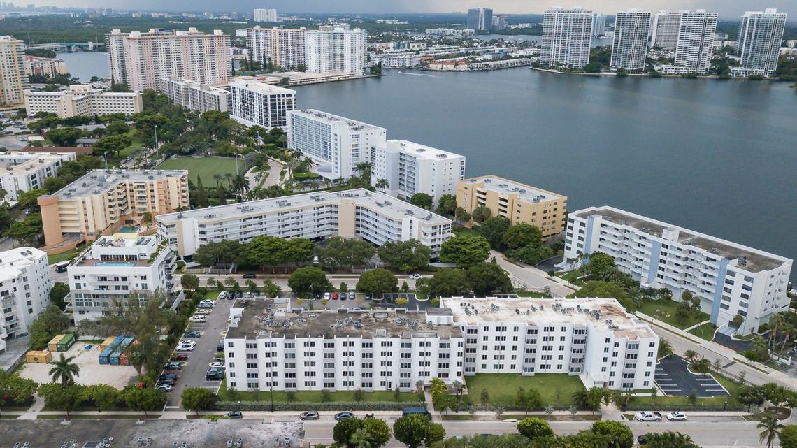 Aerial view of the Caribbean Breeze Condominium, bottom-center, on Monday, July 29, 2024, in Sunny Isles Beach, Fla. Some residents at the condominium pay over $800 a month in homeowners association fees, which has increased year after year. Some residents said they could not afford higher payments, including upcoming reserves.