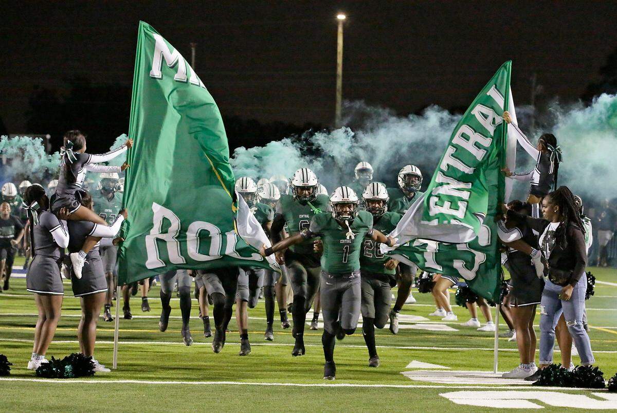 Miami Central Rockets take a field for the Class 2M state semifinal game against St. Petersburg Lakewood Spartans on Friday, December 2, 2022 at Traz Powell Stadium in Miami. Andrew Uloza / for Miami Herald