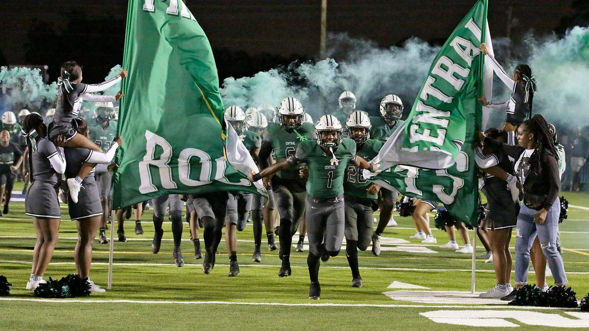 Miami Central Rockets take a field for the Class 2M state semifinal game against St. Petersburg Lakewood Spartans on Friday, December 2, 2022 at Traz Powell Stadium in Miami. Andrew Uloza / for Miami Herald