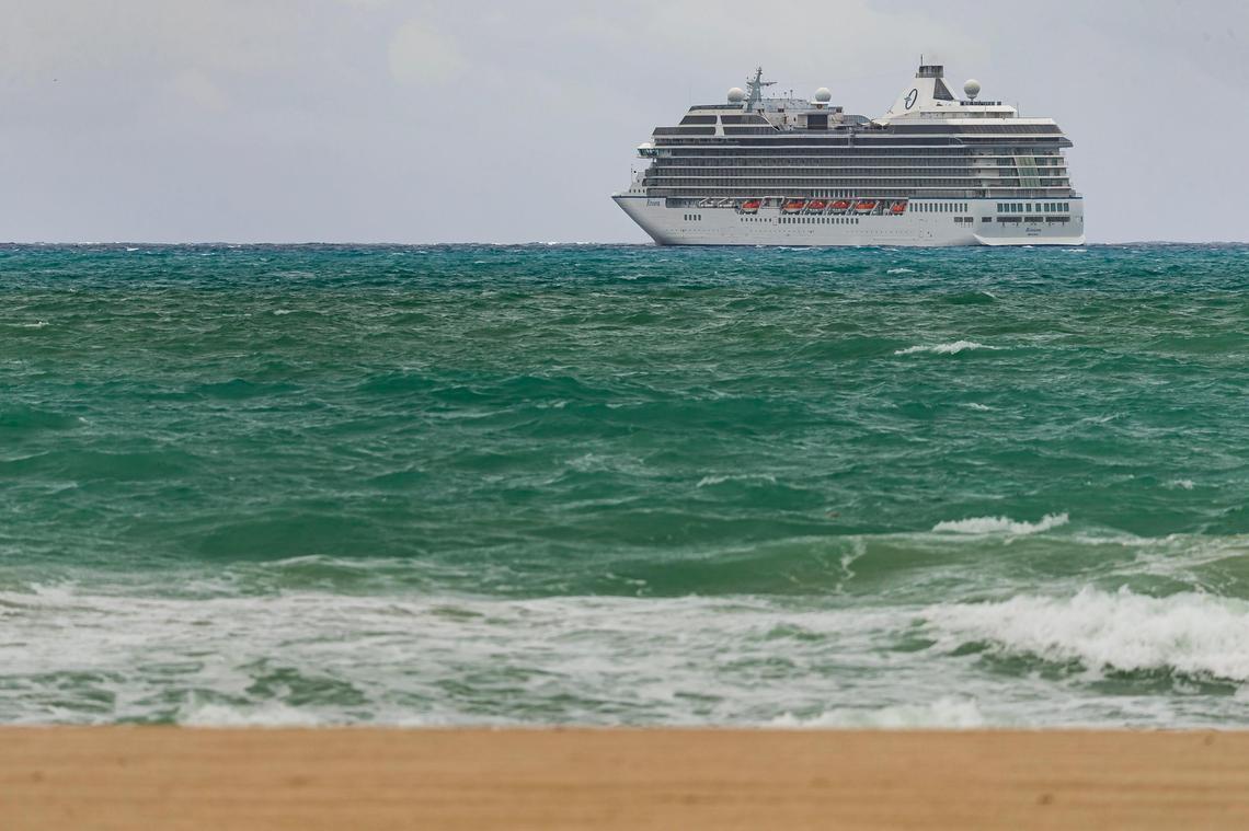 The Oceania Cruises’ Riviera ship can be seen out in the water near Miami Beach, Florida on Friday, May 15, 2020.