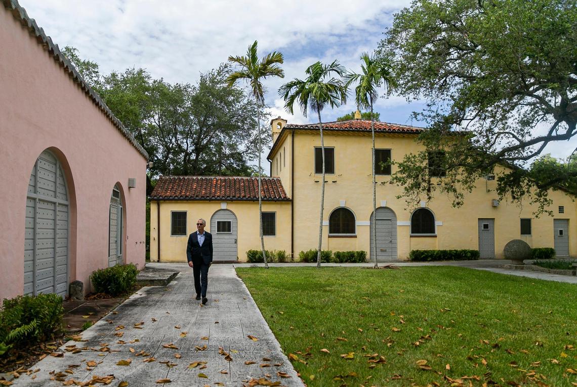 Joel Hoffman, executive director and CEO of Vizcaya Museum & Gardens, strides across the farm quadrangle at Vizcaya Village, which sits across South Miami Avenue from the main estate property. The village, formerly the estate’s working farm and maintenance area, will be restored and opened to the public under a multi-million-dollar plan.