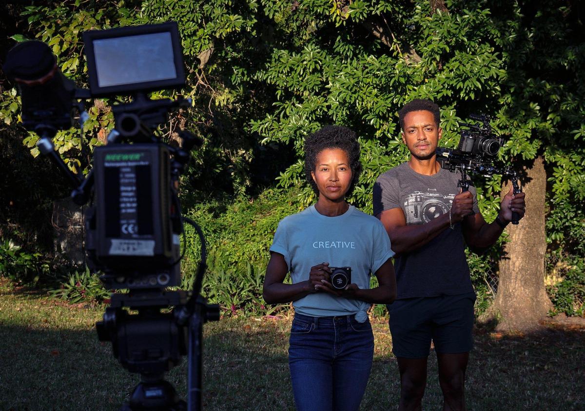 On Jan. 6, 2022, Creative Media Group founders Maria Taylor, 43, left, and Tony Delerme, 42, stand on the empty lot, the future site of their company’s Miami office, where they hope to teach young filmmakers.